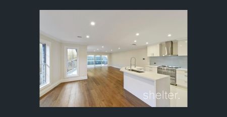 Modern Family Living | 5 Bedrooms + Substantial Living Space - Photo 4