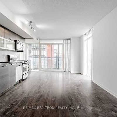 MUST SEE TWO LEVELS QUEEN WEST 1 BED PARKING INCLD - Photo 1