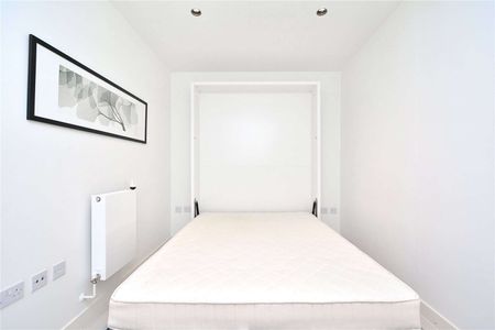 A light, bright and spacious studio suite situated on the fifth floor of this prestigious development located in West Wapping. - Photo 3