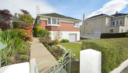 Charming 3BR Home in Maori Hill - Photo 3