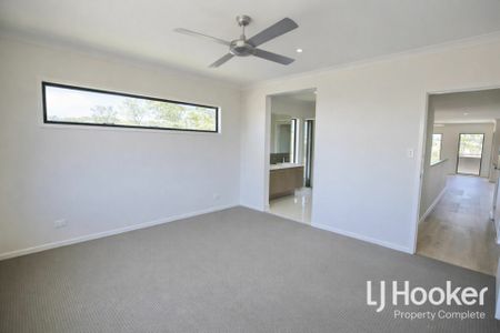 Modern Suburban Living - Walking Distance to Schools - Larger than Most Homes - Photo 4