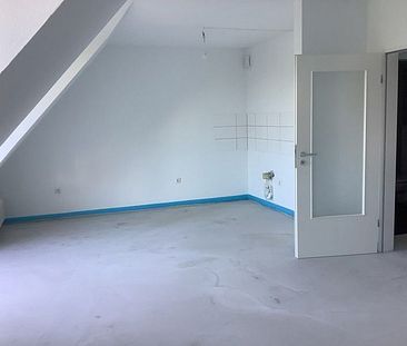 Mitten drin satt nur dabei: 1-Zimmer-Dachgeschosswohnung - Photo 1