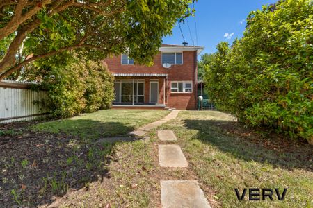 DELIGHTFUL THREE-BEDROOM HOME - Photo 2