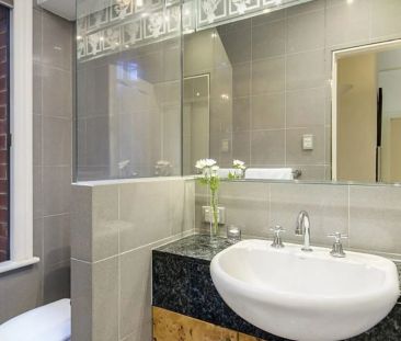 Stylish & Secure home in wanted locale - Photo 2