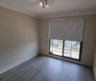 This 2 bedroom highrise apartment in the heart of Bankstown - Photo 6