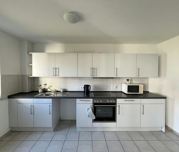 Gemütliche Erdgeschosswohnung mit Einbauküche und Abstellraum - Photo 2