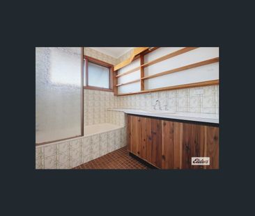 Charming 4-Bed, 2-Bath Home with Modern Upgrades & Spacious Backyard - Photo 5