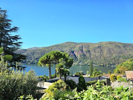 Wohnung in Villa: Erdgeschoss mit Kamin, Sitzplatz und Seeblick - Foto 5