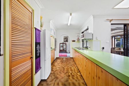 Spacious Coastal Home with Vaulted Ceilings and Drive-Through Garage - Photo 4