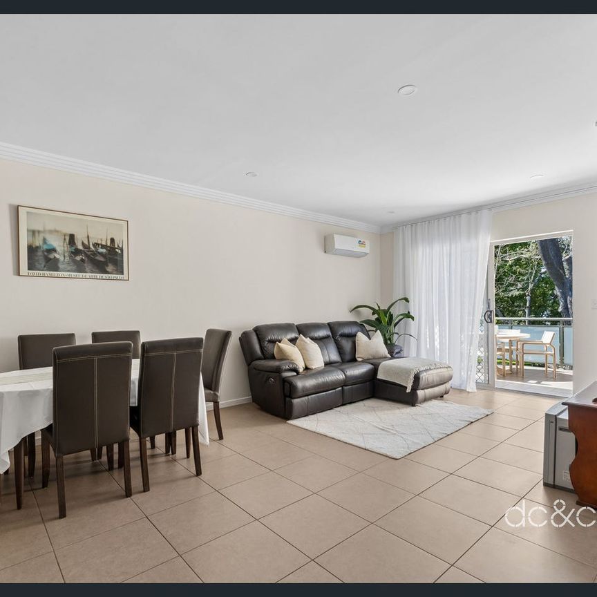 Effortless modern living in a boutique complex - Photo 1