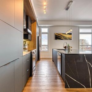 Penthouse 5 ½ adossé au golf de Saint-Lambert! 2 159 pi² - Photo 2