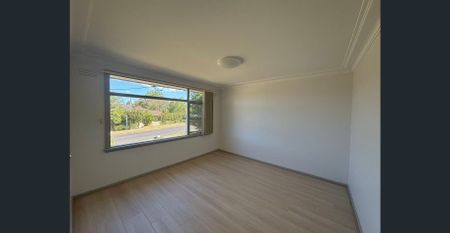 Solid Brick Home with Sunlit Interiors in a Convenient Location - Photo 5