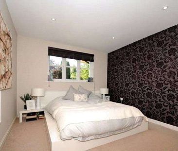 A modern first floor apartment in a gated development. - Photo 6