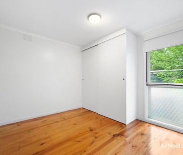 CONVENIENTLY LOCATED, FRESHLY UPDATED TWO-BEDROOM UNIT - Photo 6