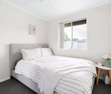 3-Bedroom Home with Large Backyard & Double Bay Shed - Photo 4