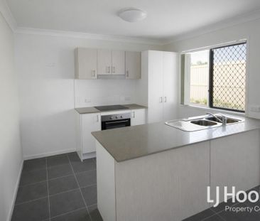 Affordable Comfort in Prime Loganlea Location! - Photo 4