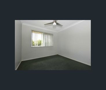 Convenient & Contemporary: Fantastic 3-Bedroom Home Ready in Sought... - Photo 5