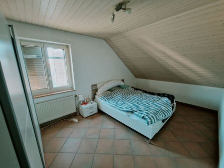 The charm of the converted attic - Photo 2