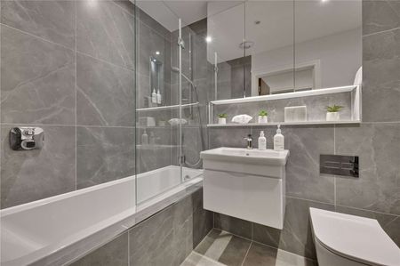 A one bedroom ground floor apartment with private enclosed terrace and allocated basement parking. - Photo 4