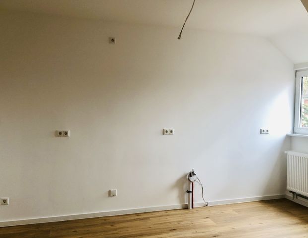 Sanierte Dachgeschosswohnung direkt in der Innenstadt - Photo 1