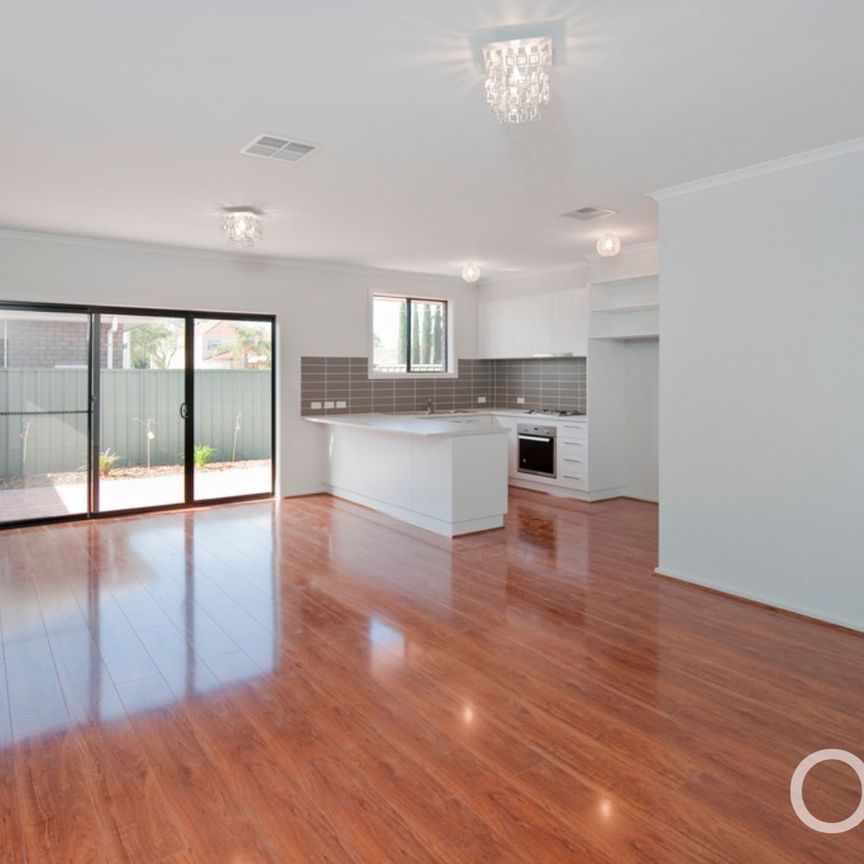 Open the Door To Elevated Modern Living in a Versatile Family Home - Photo 1