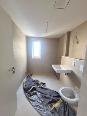 Modernes Wohnen über den Dächern von Favoriten - Foto 1