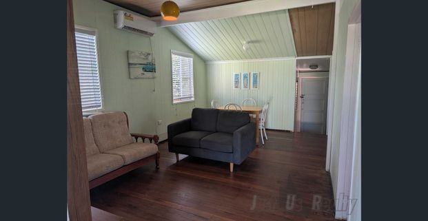 Affordable Seaside Cottage – One Block from the Waterfront - Photo 1