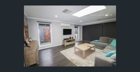 Modern Comfort in a Spacious Family Home - Photo 2