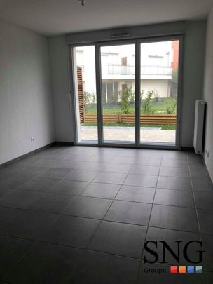 T2 AVEC TERRASSE+JARDIN+PARKING - Photo 1
