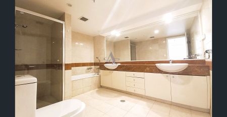 Spacious 3 Bedroom Apartment with Parking in CBD - Photo 5