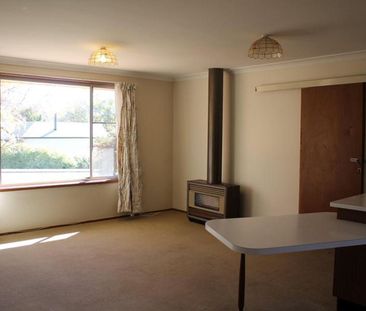 Tidy Two-Bedroom Unit in Peaceful Location - Photo 2