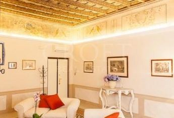Center-Historic Jewish Quarter: Elegant apartment situated in beautiful Palazzo Nobiliare. Entrance, spacious living with original wood frescoed ceilings, large modern dining and kitchen, 4 bedrooms, 4 Baths, small terrace. #1527