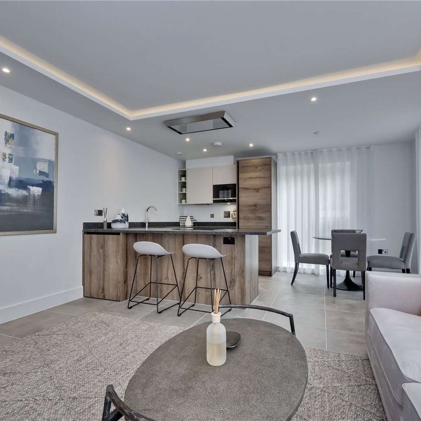 A one bedroom ground floor apartment with private enclosed terrace and allocated basement parking. - Photo 1