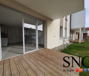 T2 AVEC TERRASSE ET JARDIN + 2 PARKINGS SOUS SOL - Photo 2