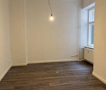 Attraktive Erdgeschosswohnung in zentraler Lage! - Photo 1