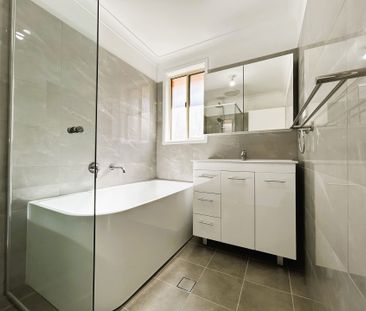 Stylish Renovated Home Offering Comfort, Space & Convenience - Photo 1