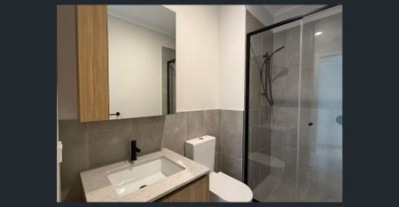 Modern 4-Bedroom Family Home in the Heart of Wollert - Photo 4