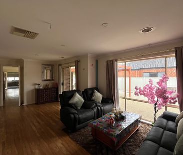 Modern 4-Bedroom Home with Multiple Living Areas - Photo 3