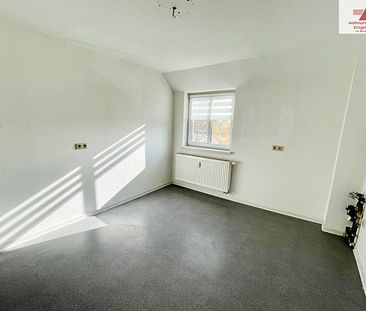 Geräumige 2-Raum-Dachgeschosswohnung in Deutscheinsiedel - Photo 1