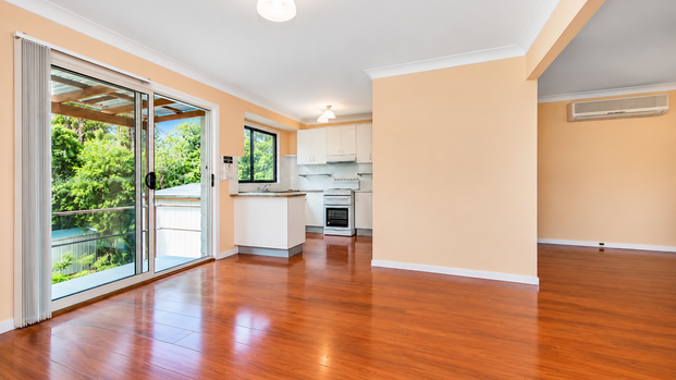 COMFORTABLE FAMILY LIVING WITH SPACIOUS INTERIORS & GENEROUS BACKYARD! - Photo 1