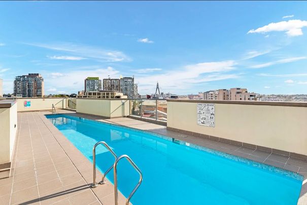 Spacious Four-Bedroom Home with Split-Level Design in a Peaceful Harbourside Setting - Photo 1