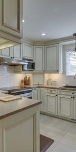 5 1/2 avec jardin privé et 3 stationnements - Photo 3