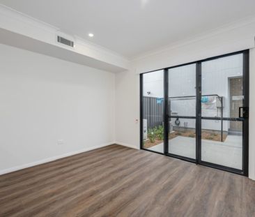 Modern 3-Bedroom Townhouse with Style and Convenience - Photo 3