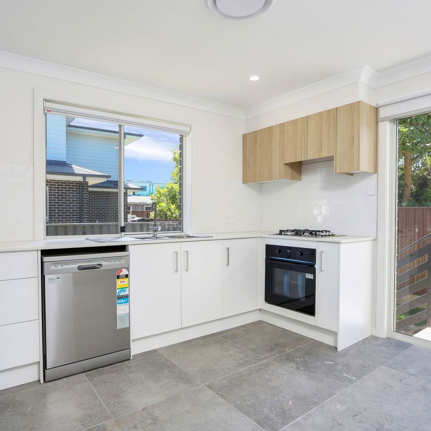 Brand New Four Bedroom Townhouse In Great Location! - Photo 1