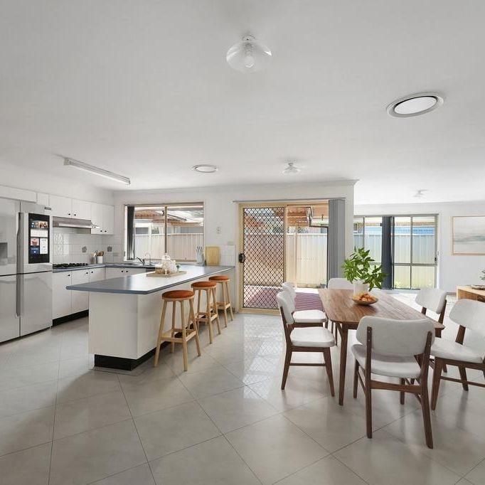 Discover your perfect family retreat, nestled in the heart of Casula! - Photo 1