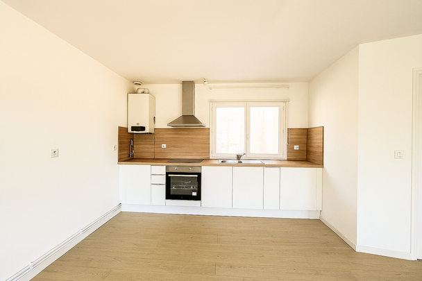 Location Appartement 4 pièces 65m² VALENCIENNES 59300 - Photo 1
