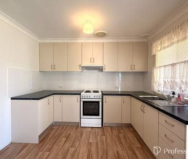 FRESHLY PAINTED FAMILY HOME! - Photo 5