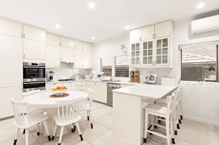 Newly Renovated Family Home with Spacious Layout and Multipurpose Backyard Retreat - Photo 4