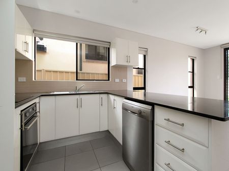 Four-Bedroom Duplex Close to Beach - Photo 5