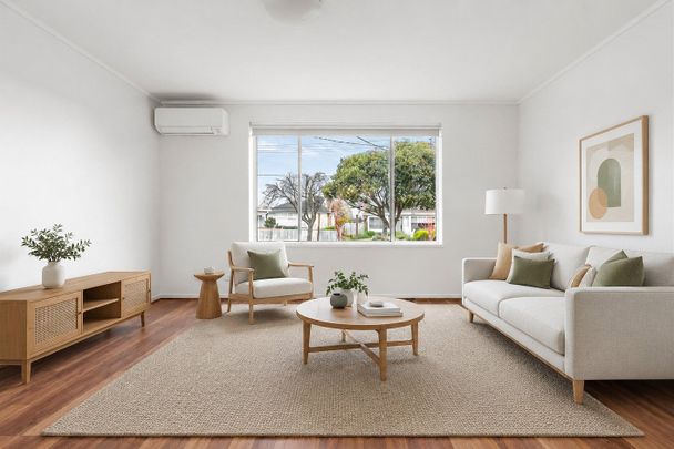 Stylish Two-Bedroom Living in a Convenient Location - Photo 1
